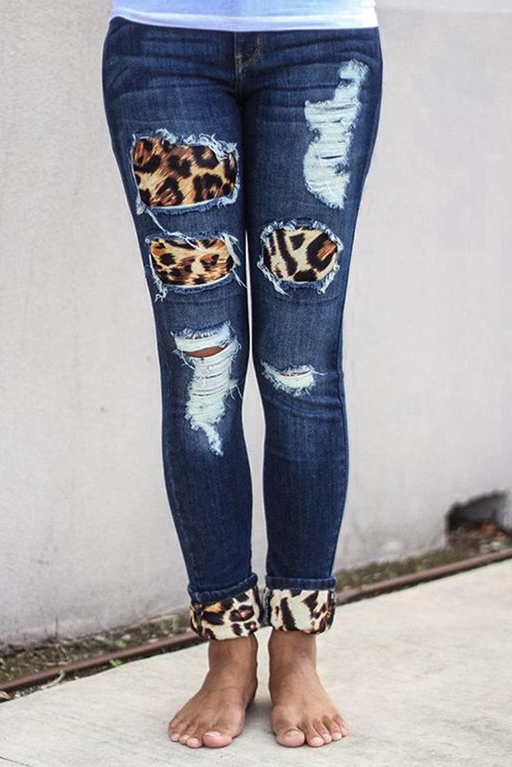 Hollow Out Leopard Splice Ripped Jeans
