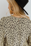 Apricot Printed Ruffled Funnel Neck Puff Sleeve Blouse