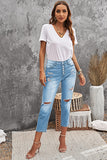 High Rise Button Front Distressed Denim Pants