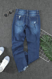 Medium Wash High Rise Distressed Skinny Jeans