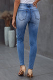 Medium Wash Distressed Halloween Pumpkin Face Patches Skinny Jeans