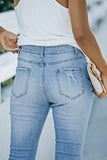 High Rise Distressed Flared Jeans